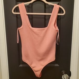Pink Lily bodysuit